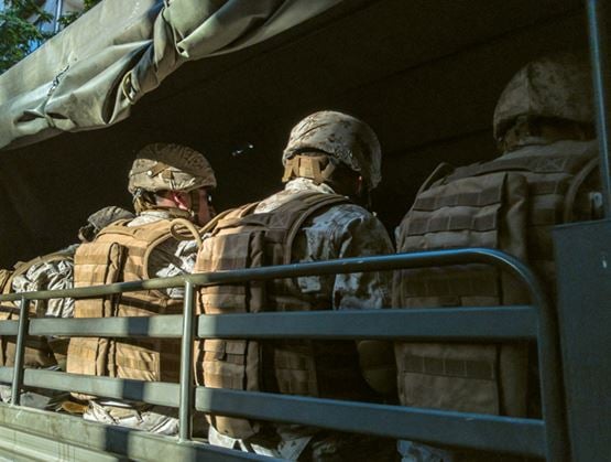 Military men in a truck