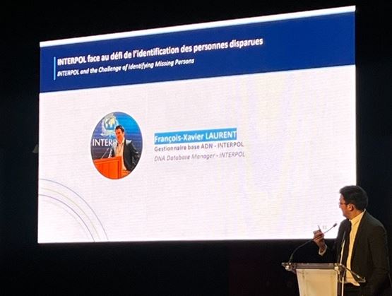 INTERPOL conference presentation at Milipol Paris highlighting international cooperation and public engagement in missing persons identification