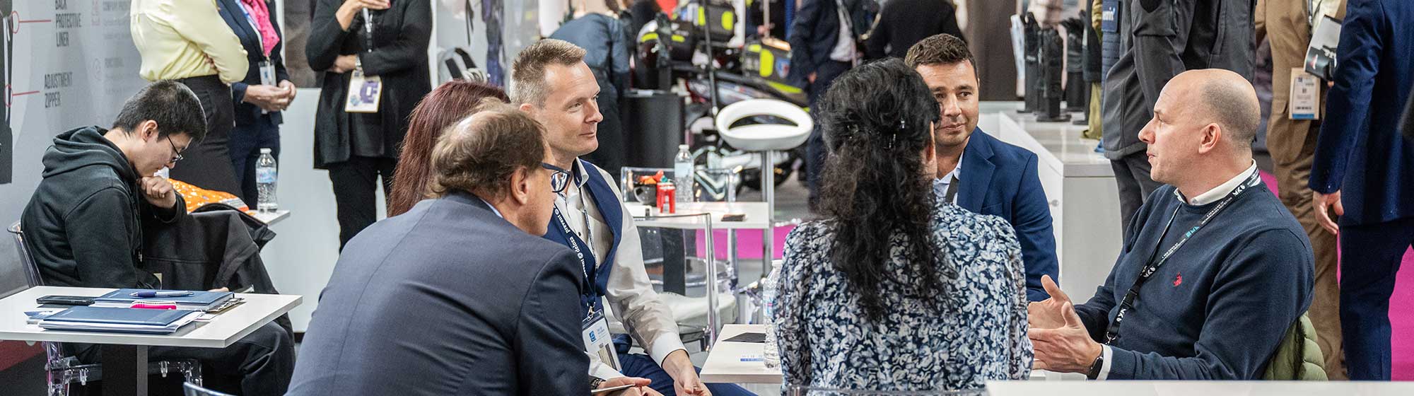 Group of people during a business on a stand