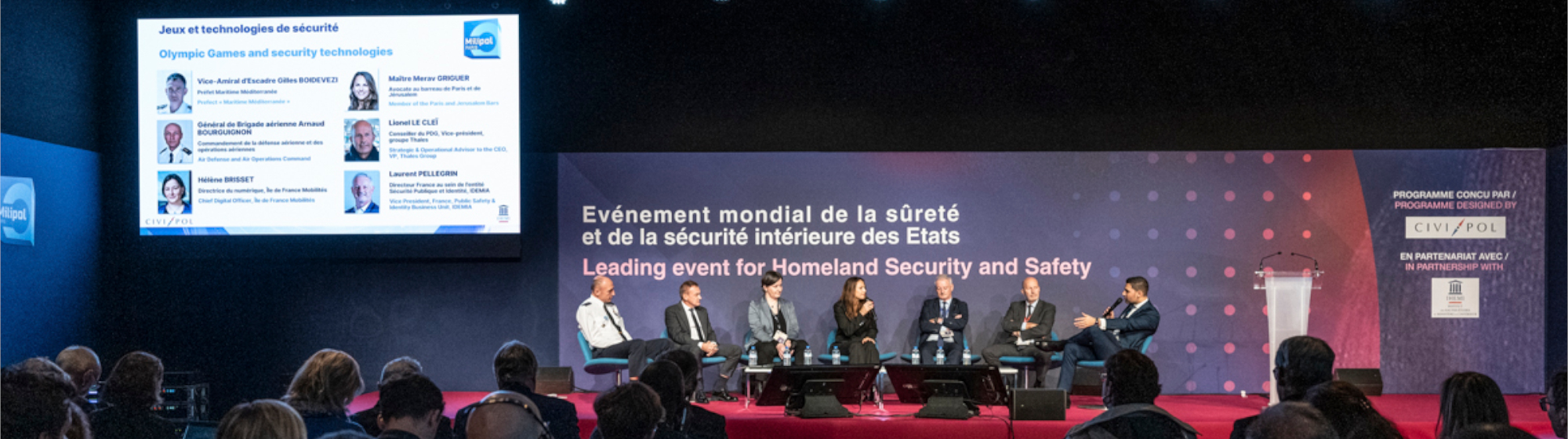 Conférence sur la sécurité intérieure avec des experts sur scène lors de Milipol Paris, l'événement mondial sur la sûreté et la sécurité des États, avec un large public.