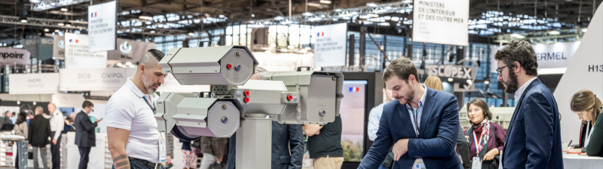 View of a product on Milipol Paris with the stand of the French Ministry of Interior and DCIS