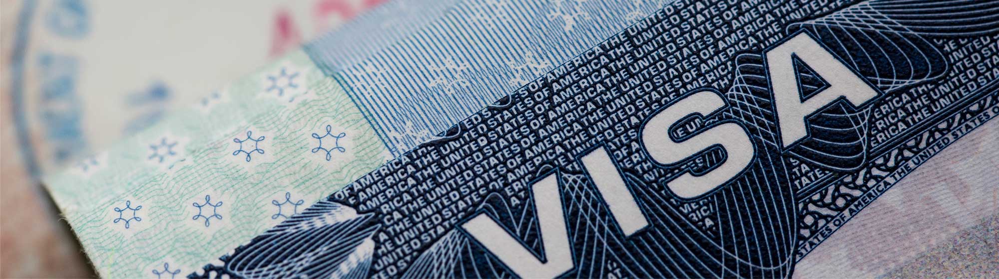 A close-up of a Visa card displaying the word "Visa"