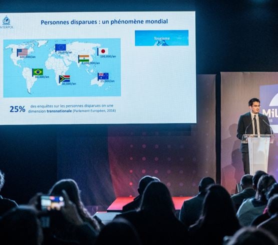 Milipol Paris conference on missing persons with a speaker from interpol presenting global statistics, including country-specific data on missing persons.