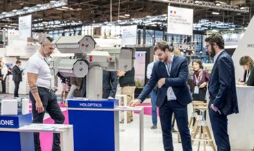 View of a product on Milipol Paris with the stand of the French Ministry of Interior and DCIS