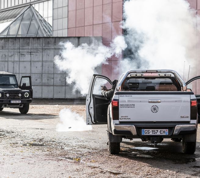 Live performance demonstration from Special Forces during Milipol Paris, with an audience watching.