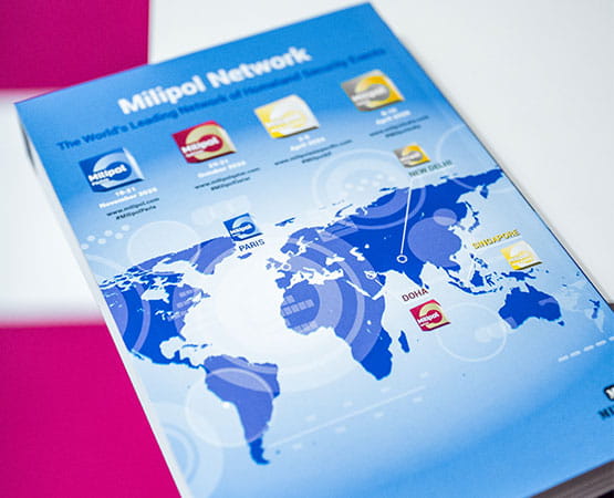 Flyer Milipol Network posé sur une table