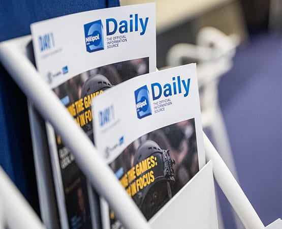 rack containing daily newspapers