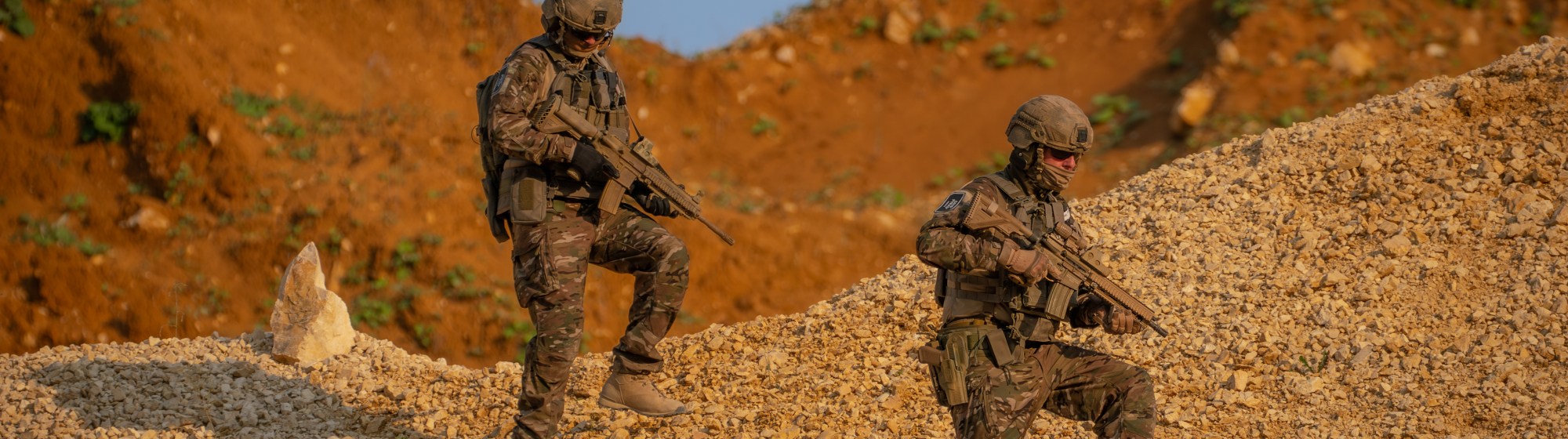 Two militaries in lightweight combat suits with flame protection by Gore-Tex